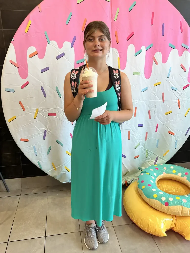 Young Girl Holding Drink